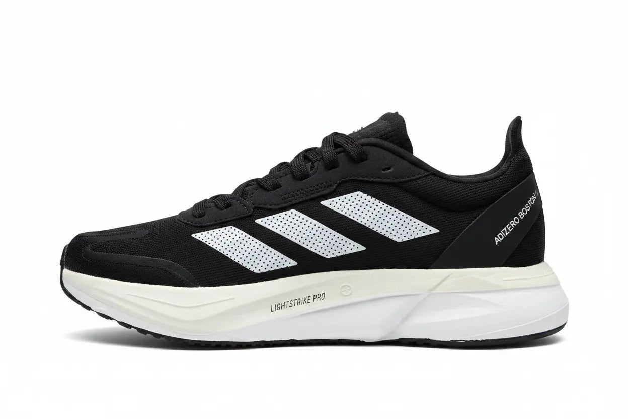 Black running shoe with white sole on a white background