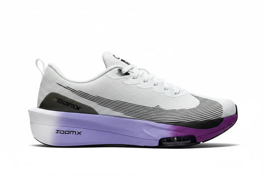 A Nike running shoe with a white upper, black Swoosh and ZoomX branding, and a thick white and purple gradient ZoomX midsole.