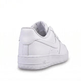 Triple white low-top sneaker rear view
