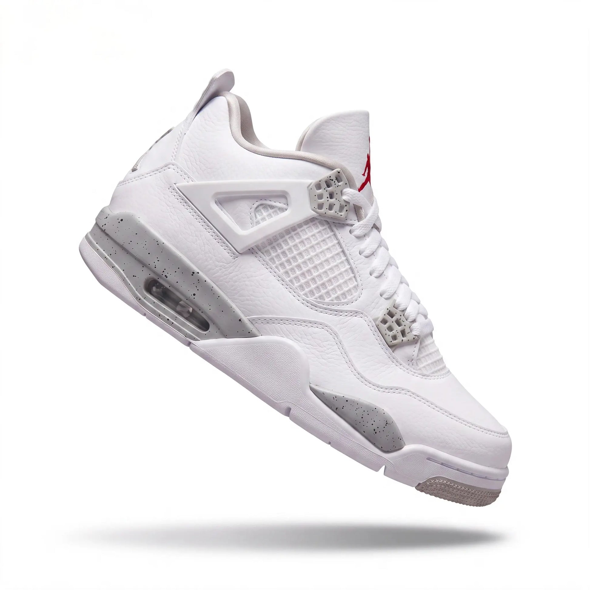 A white Air Jordan 4 sneaker with silver rhinestone detailing on the ankle strap and a red Jumpman logo on the tongue, shown floating against a white background with a soft shadow underneath.
