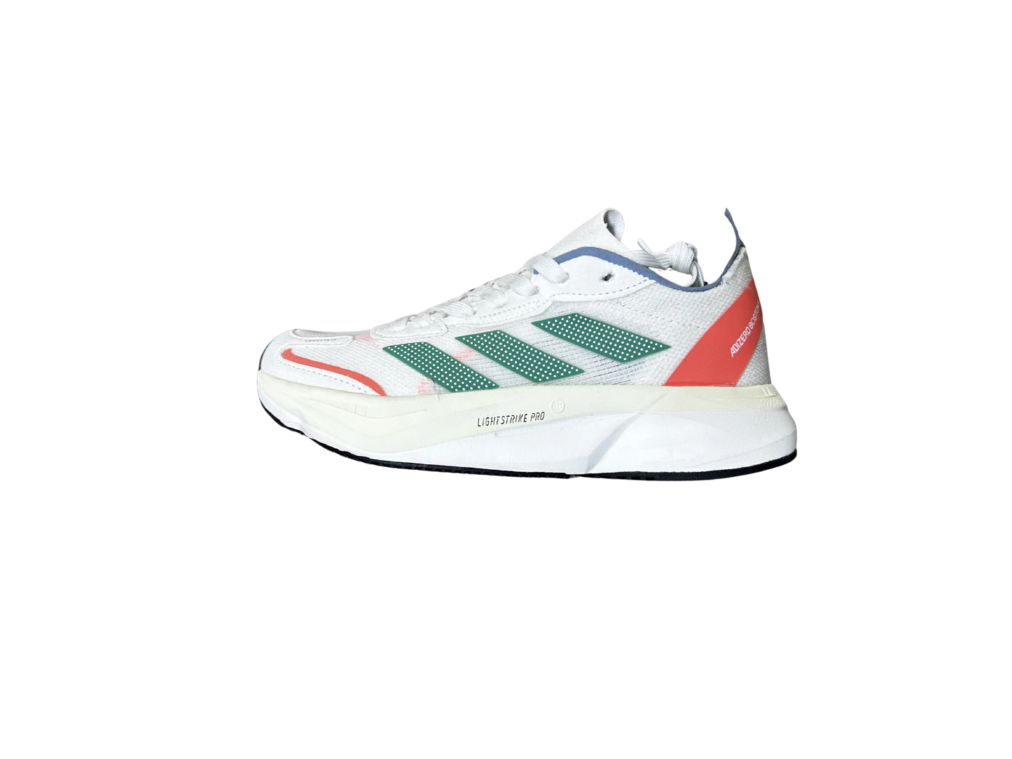 A white Adidas x Soma running shoe featuring green three-stripes, a coral-red heel tab, and a thick white midsole with 'LIGHTZONE PRO' text, shown against a plain white background.