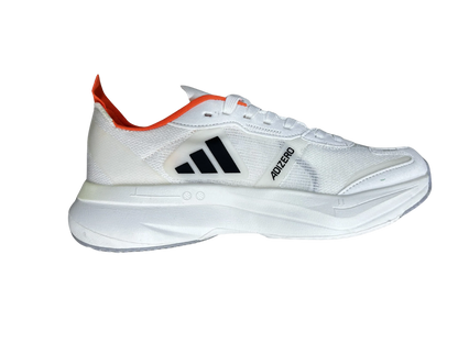 A white Reebok athletic shoe shown from a side profile view against a solid white background, featuring a black logo and a bright orange pull tab.