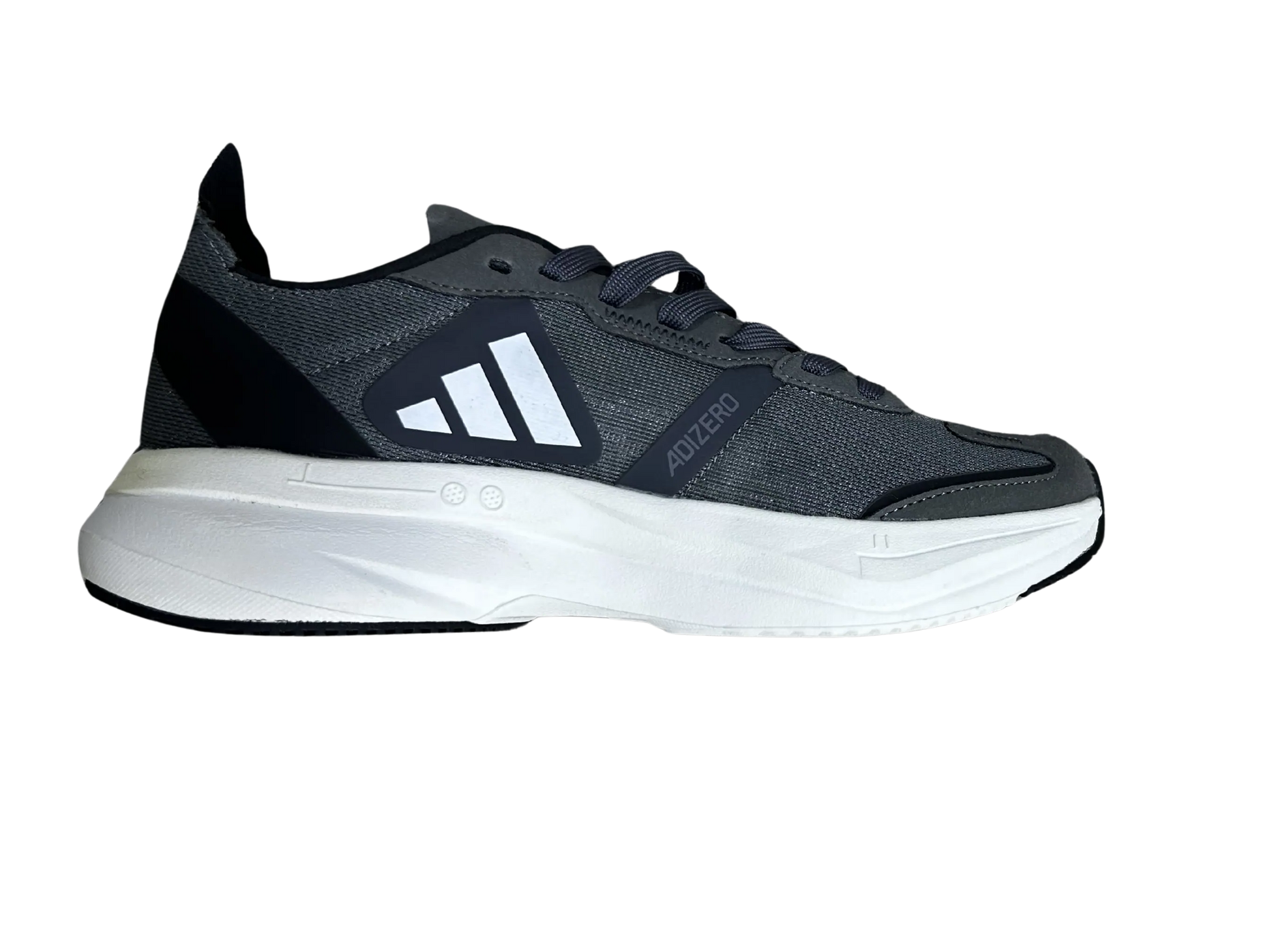 A dark gray and black athletic sneaker with a thick white midsole, shown from a side profile view against a plain white background.