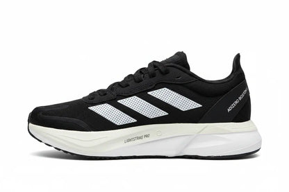 Black running shoe with white sole on a white background
