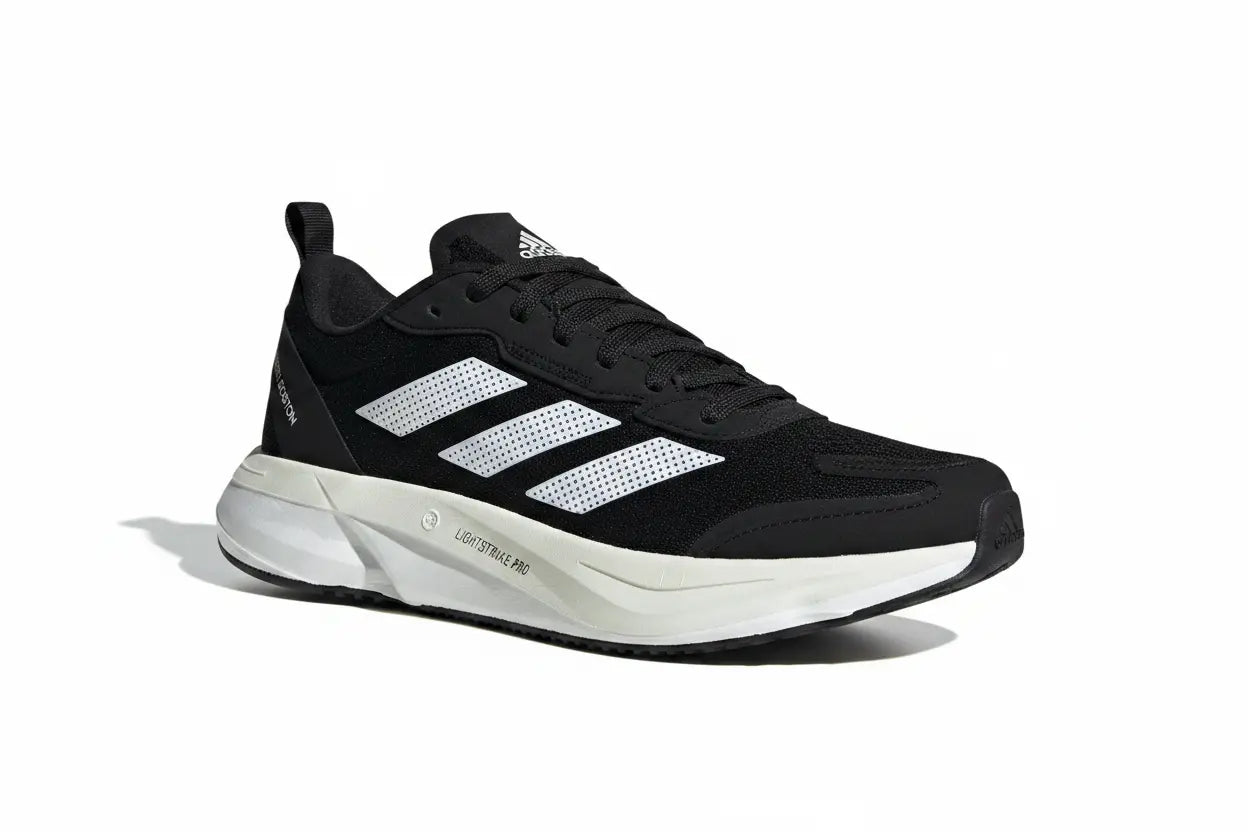 A black Adidas running shoe with three white stripes and a white midsole, shown from a side profile on a white background.