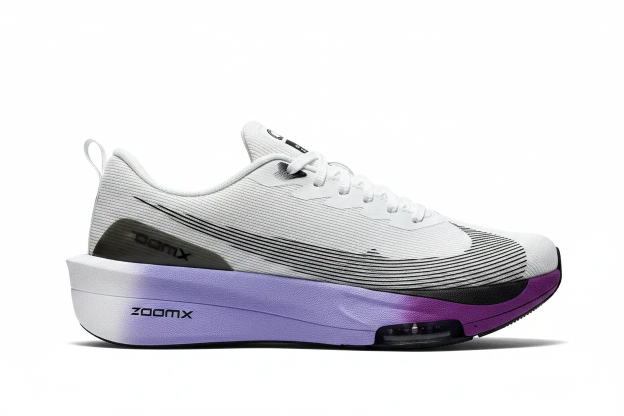 A Nike running shoe with a white upper, black Swoosh and ZoomX branding, and a thick white and purple gradient ZoomX midsole.