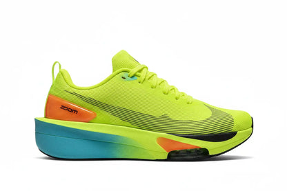 A Nike running shoe in neon yellow-green with a black swoosh, an orange heel accent, and a blue-to-turquoise gradient midsole on a white background.