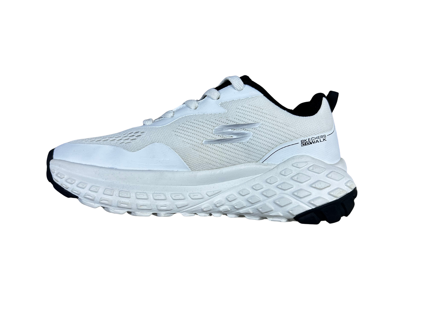 A white athletic sneaker with black accents on the heel, collar, and outsole, shown from a side profile view against a plain white background.